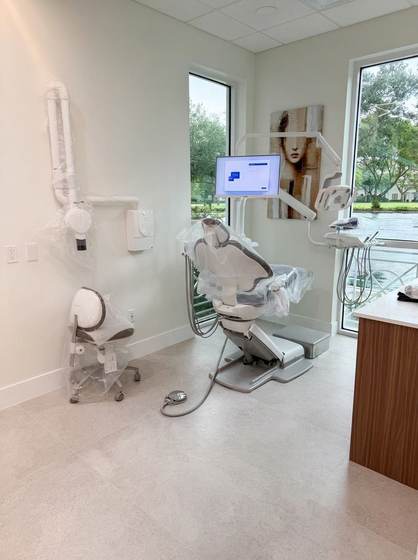 Wall-mounted display on an articulating arm