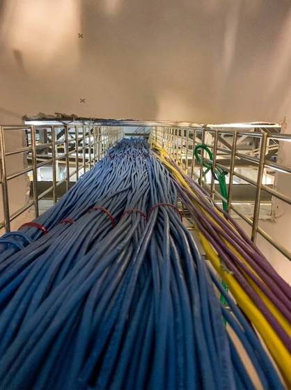 Backbone bundle running a cable tray